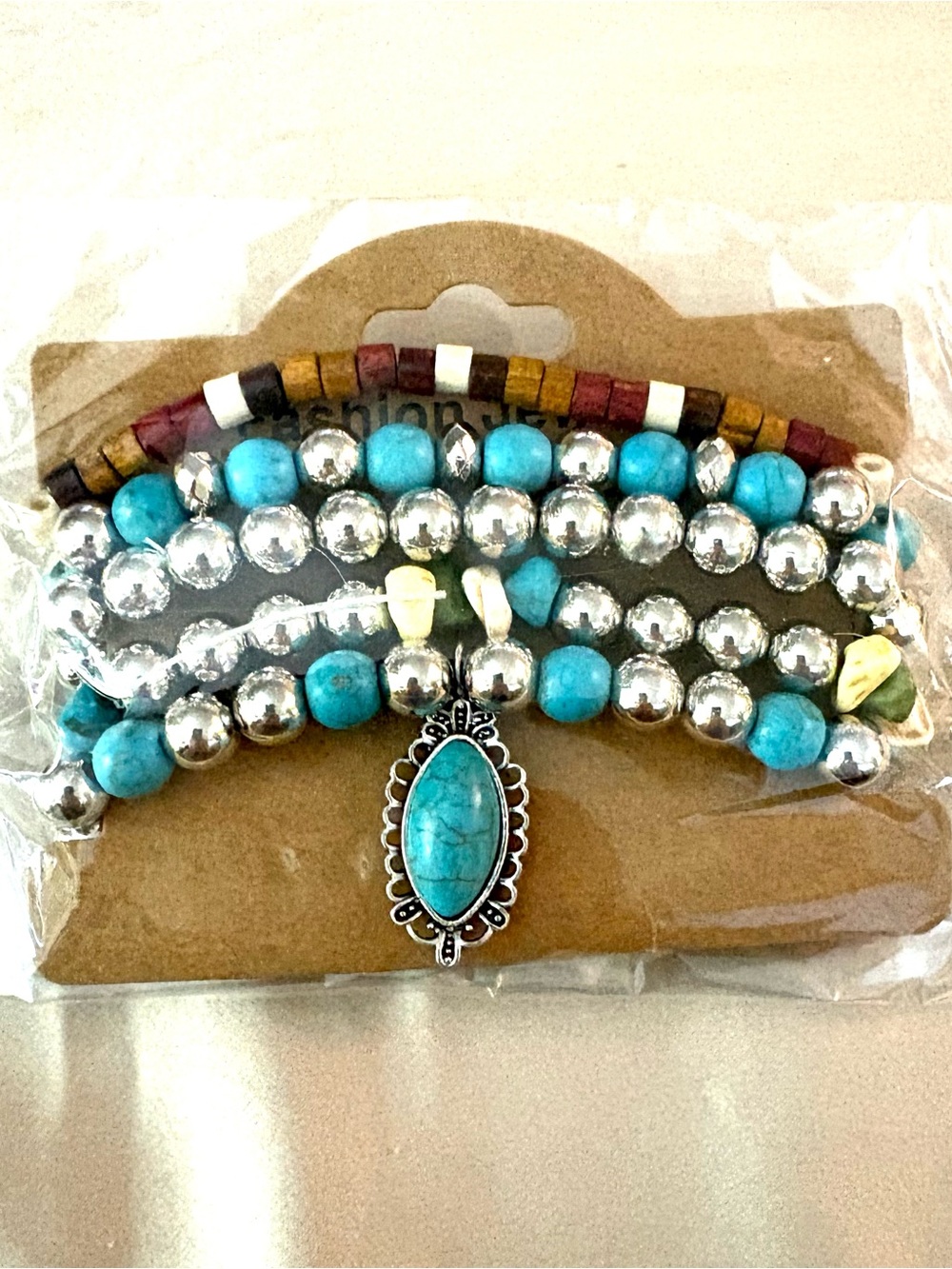 Turquoise Beaded Multi-Strand Bracelet with Silver Accent Pendant